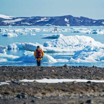 Enchanting Travels Arctic Tours - Man viewing ice floes