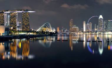 Singapore skyline at night with urban buildings