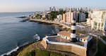 Aerial view of Barra Lighthouse and Salvador cityscape, Bahia, Brazil, South America