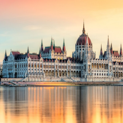 Enchanting Travels European Capitals ToursView of Budapest parliament at sunset, Hungary European Cities tours