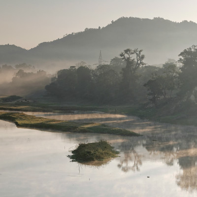 Early morning fog on river at kaziranga, Assam, India