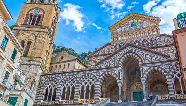 Enchanting Travels Italy Tours Ancient Roman city of Pompeii against Vesuvius volcano