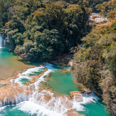 is it safe to travel to Mexico? - Aerial view of the majestic turquoise waterfalls at Agua Azul in Chiapas, Mexico, Central America