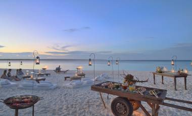 Romantic dinner at the beach at hotel Mnemba Island Lodge, Zanzibar, Tanzania - Perfect for Winter travel