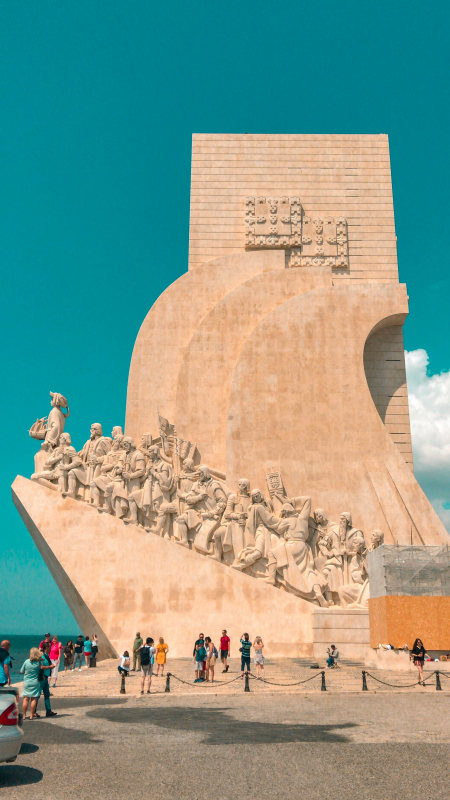 gray-concrete-statues-under-blue-sky-during-daytime