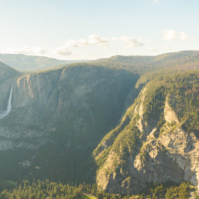 Hiker at the Glacier Point with View to Yosemite Falls and Valley