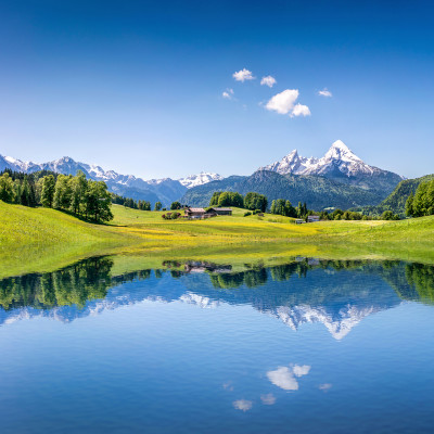 Best time to visit European Capitals - Idyllic summer landscape with clear mountain lake in the Alps - European Cities tours