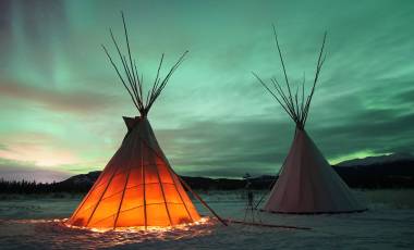Indian Tipies under the northern lights in Whitehorse, Yukon