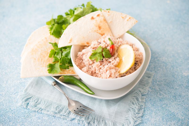 Mas Huni. Traditional Maldivian breakfast of tuna, coconut, onion and chili with chapati tortillas