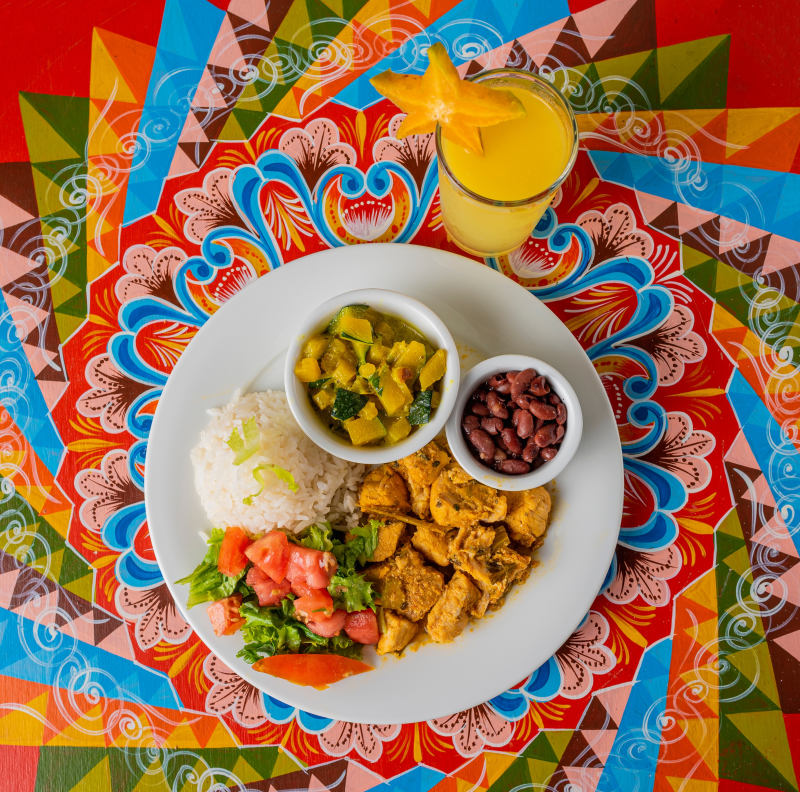 typical Costa Rican lunch on a colorful table of the Costa Rican cart