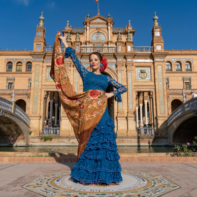 Typical Spanish woman dancing flamenco in Seville, Andalusia, Spain.-min
